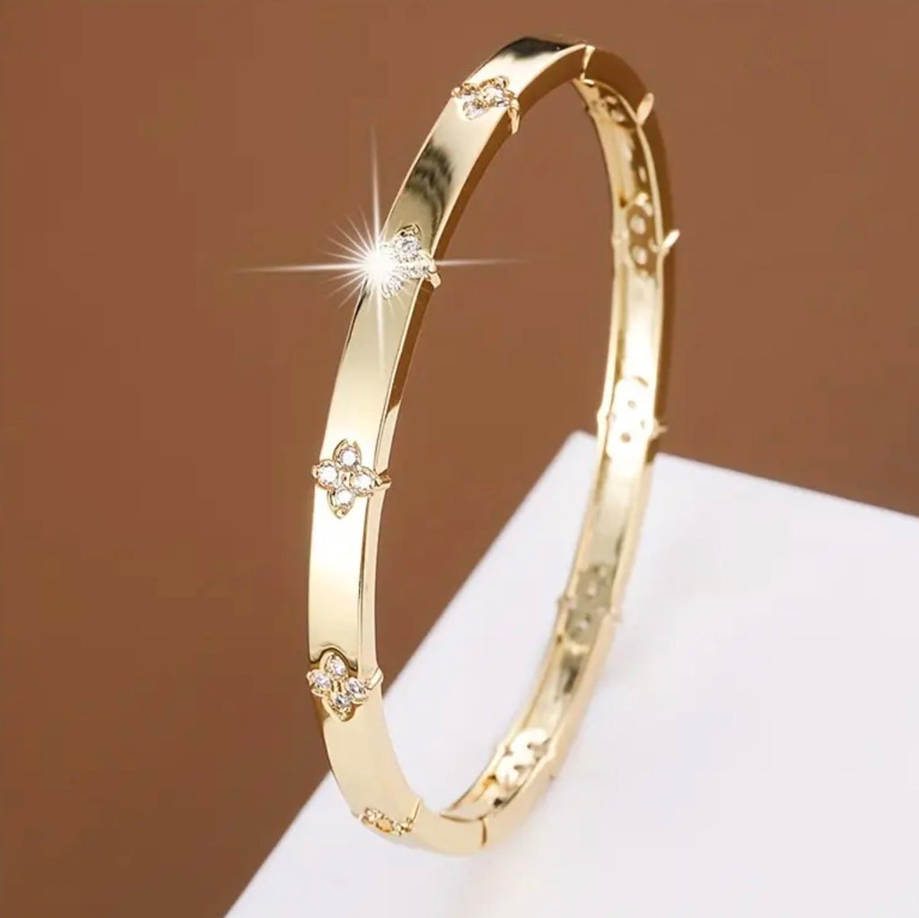 Elegant Stainless Steel- Non Tarnished Four Leaf Clover Bracelet—Golden Tone with Sparkling Accents